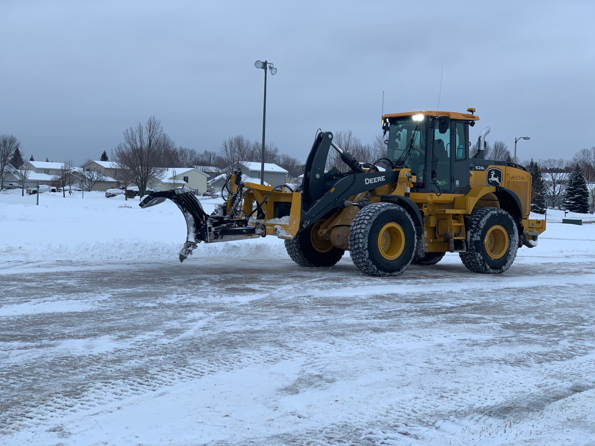 Loader Clearing Ice